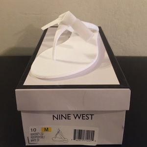 White Nine West flip flops
